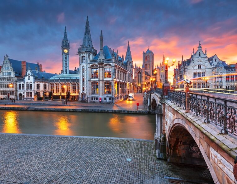 Photo of historic buildings in Ghent, at dusk